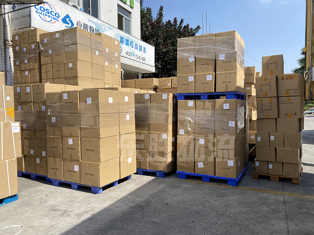 防疫物資出口，防護(hù)口罩出口裝貨運(yùn)輸現(xiàn)場(chǎng)圖；深圳東勝物流